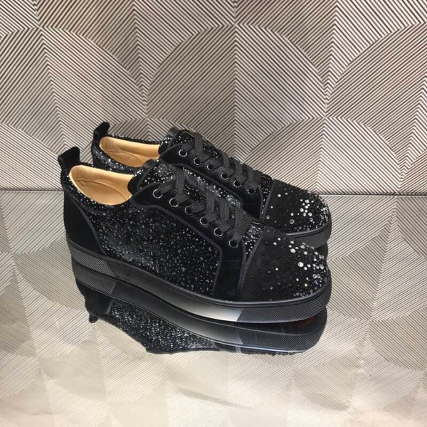 Christian Loboutin red bottom low top sneaker