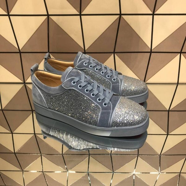 Christian Loboutin red bottom low top sneaker