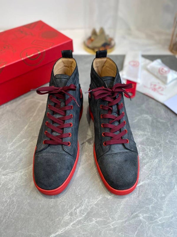 Christian Loboutin red bottom high top sneaker