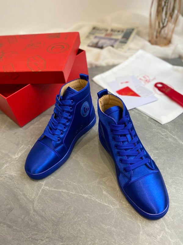 Christian Loboutin red bottom high top sneaker