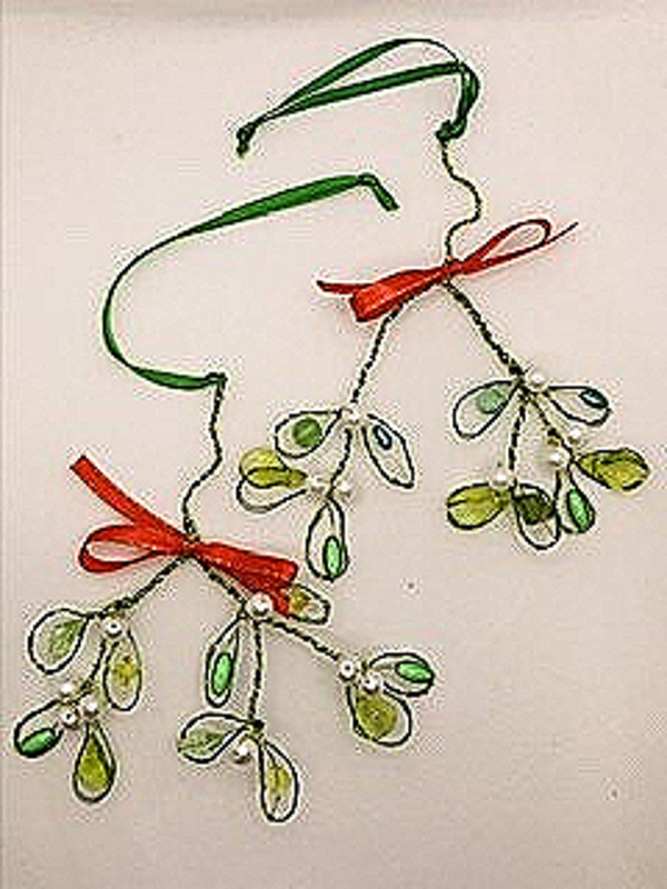 A pair of Mistletoe Christmas decorations