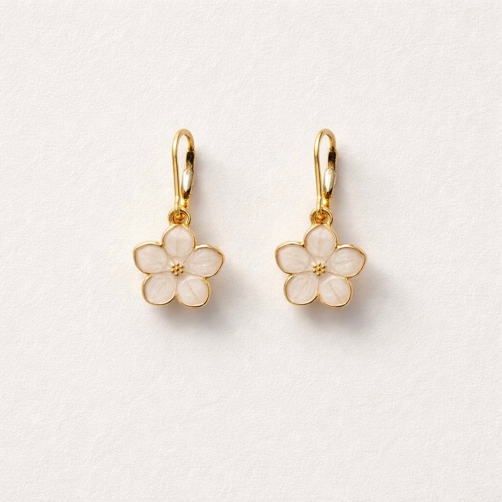 Boucles d’oreilles fleurs blanches