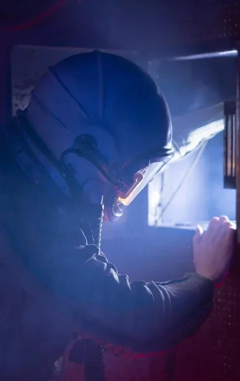Person wearing PPE in a confined space