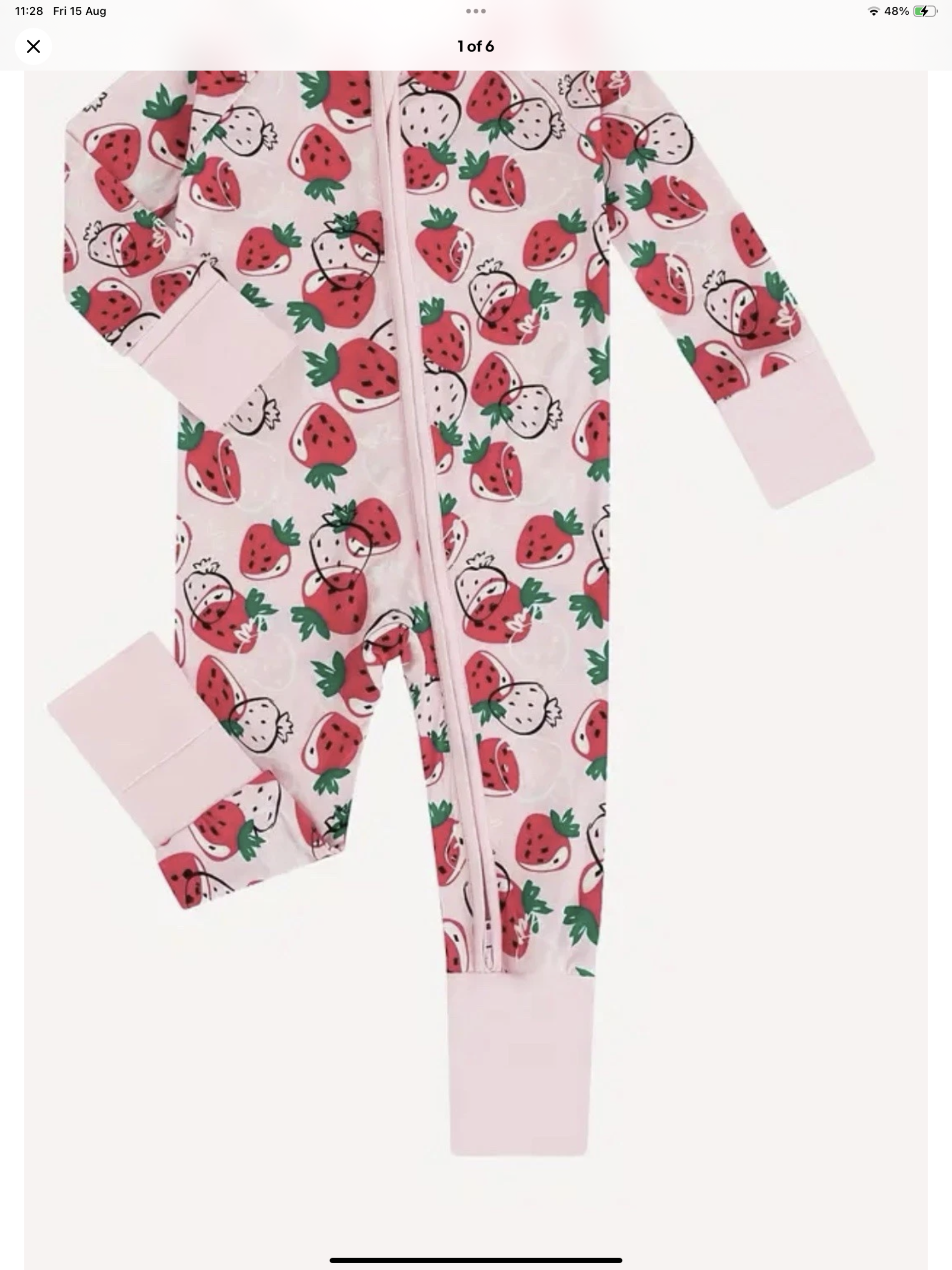 Baby girls bamboo fibre sleep suit with a strawberry design