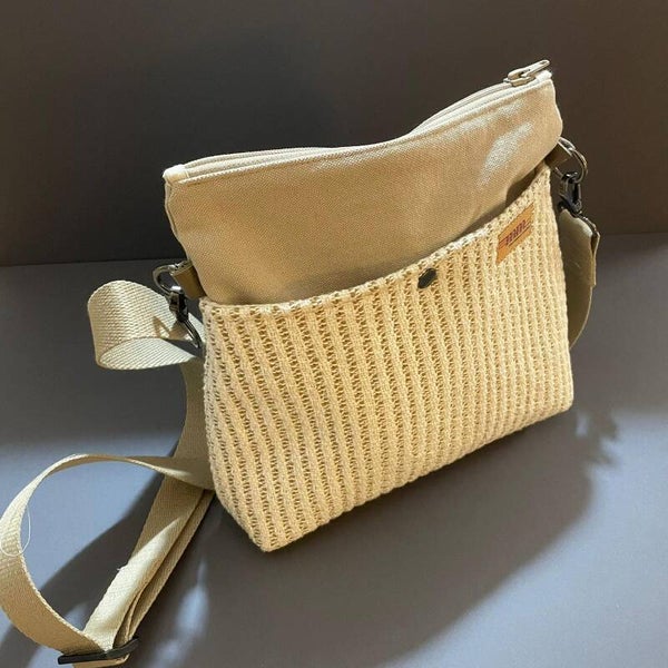 Sac à bandoulière de couleur beige