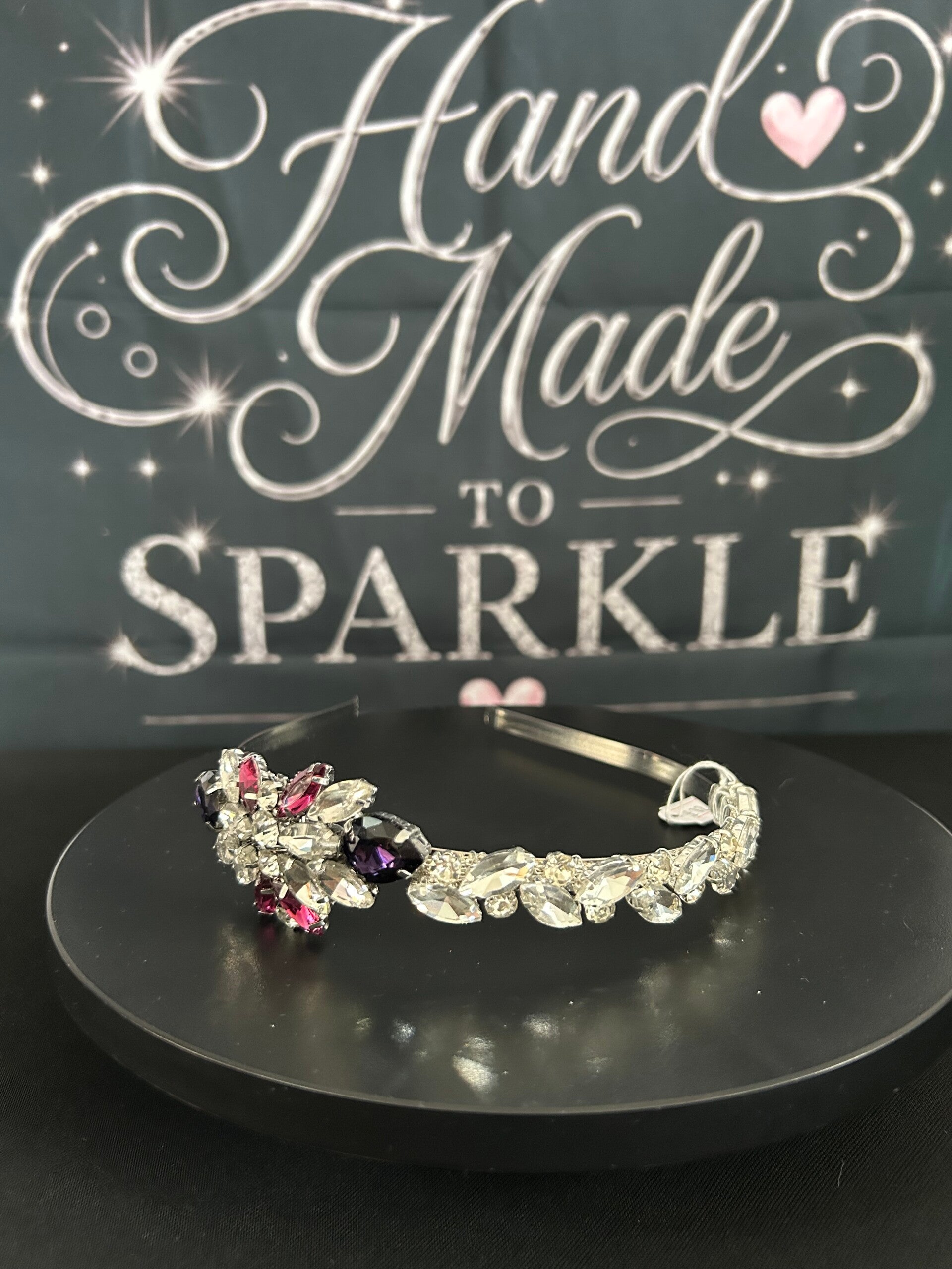 Silver headband with silver/purple embellishment