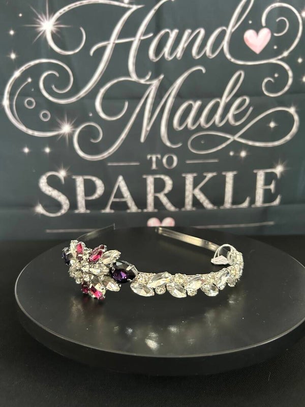 Silver headband with silver/purple embellishment