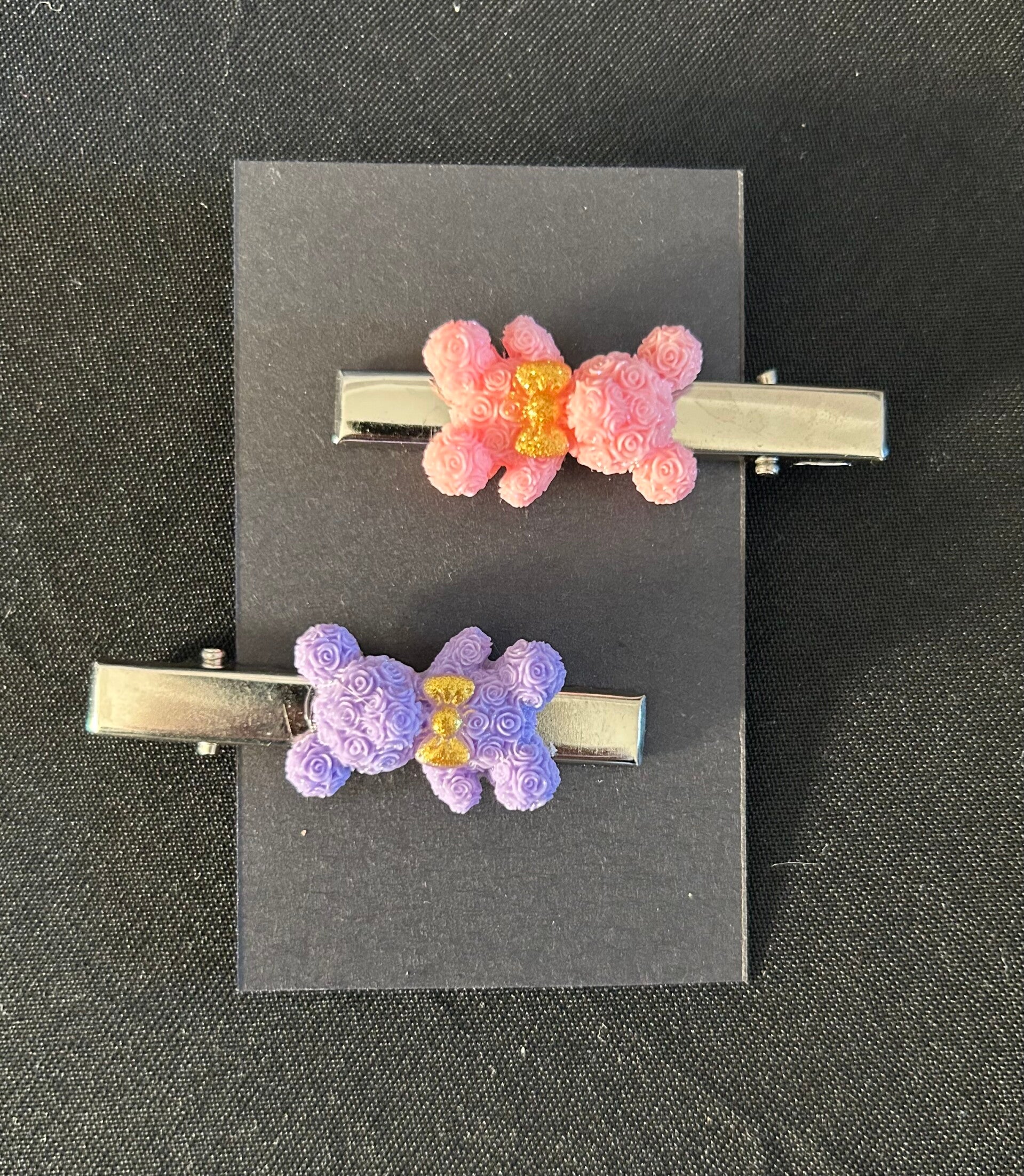 Pink and purple hair clips