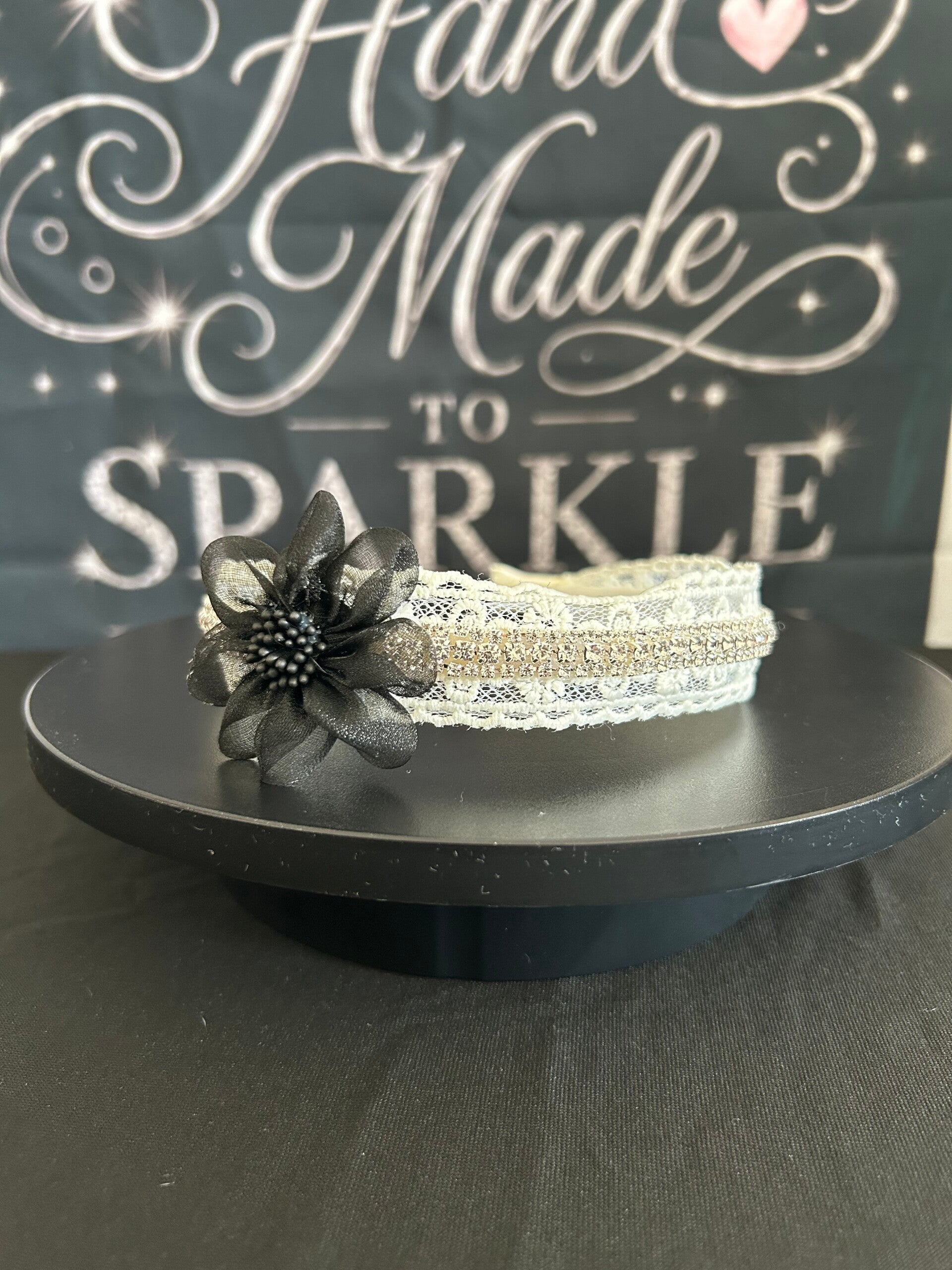Cream with black flower
