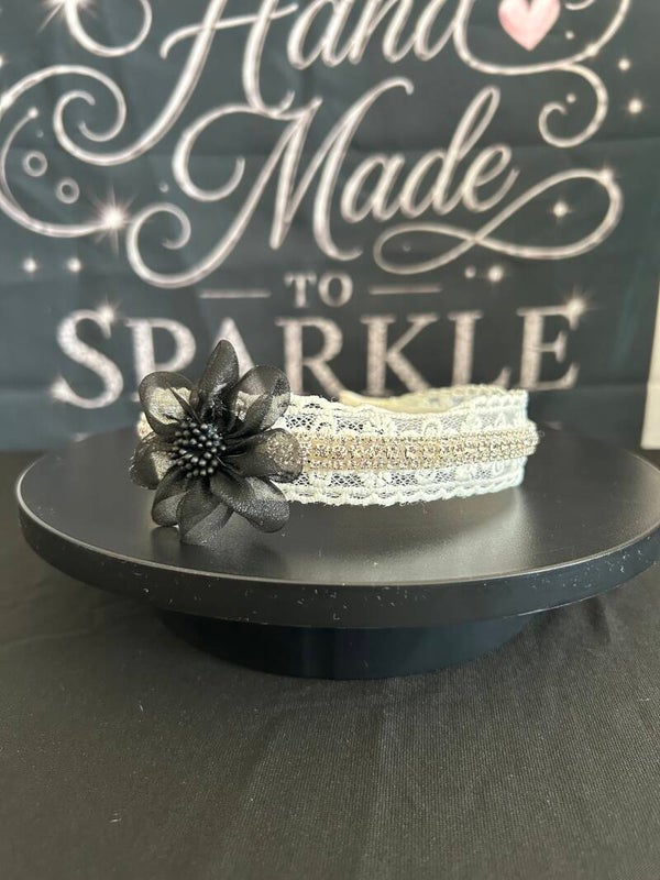 Cream with black flower