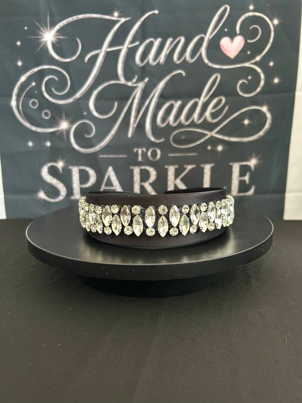 Black headband with silver trim