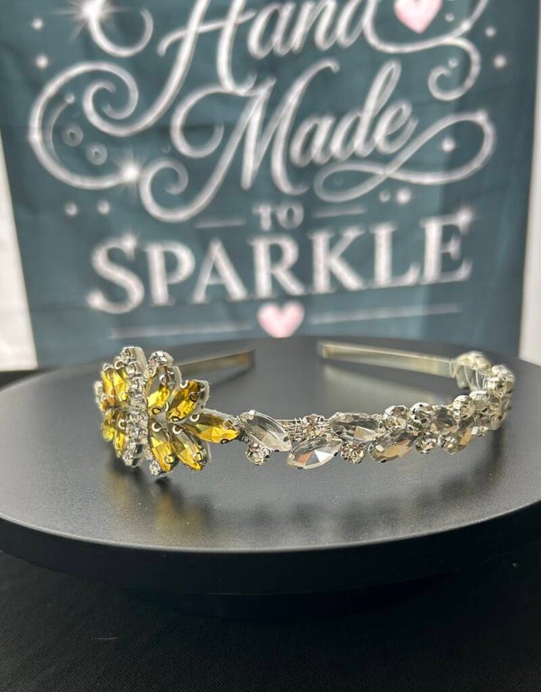 Silver headband with gold/yellow embellishment