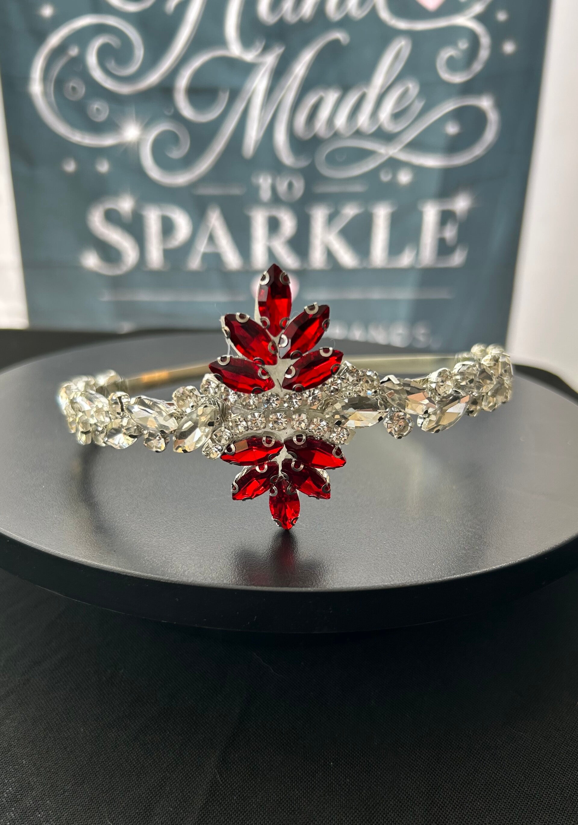 Silver headband with red embellishment