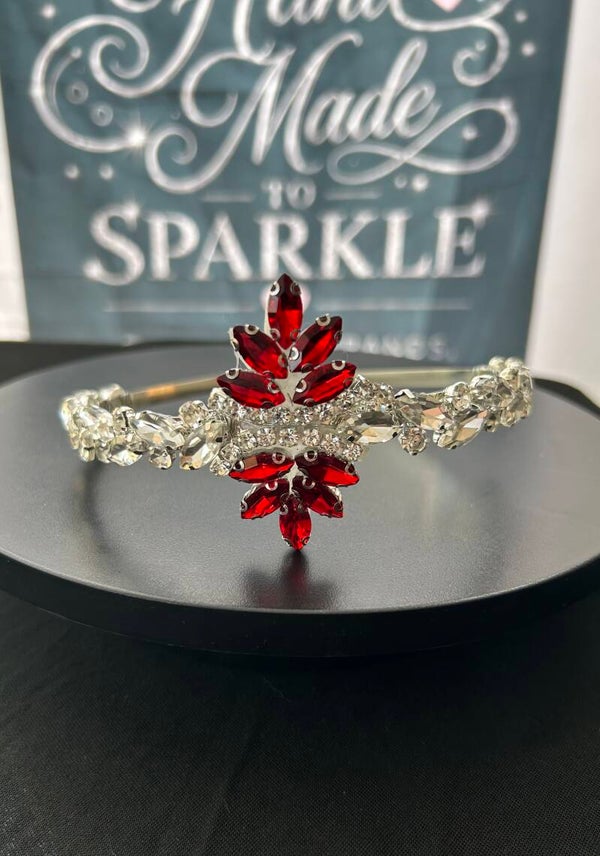 Silver headband with red embellishment