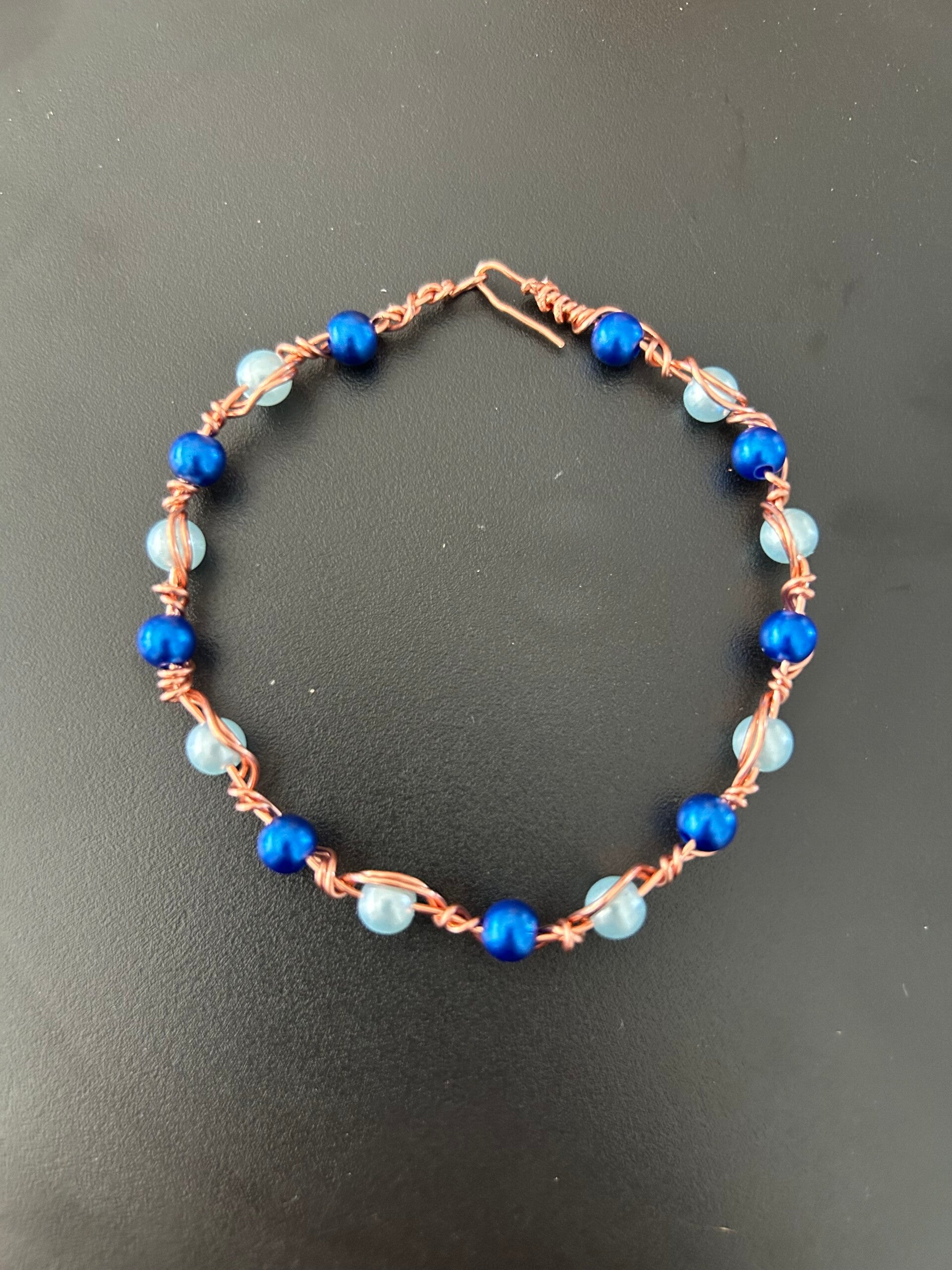 Small light blue and dark blue beads