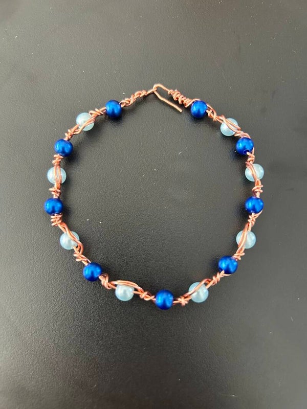 Small light blue and dark blue beads
