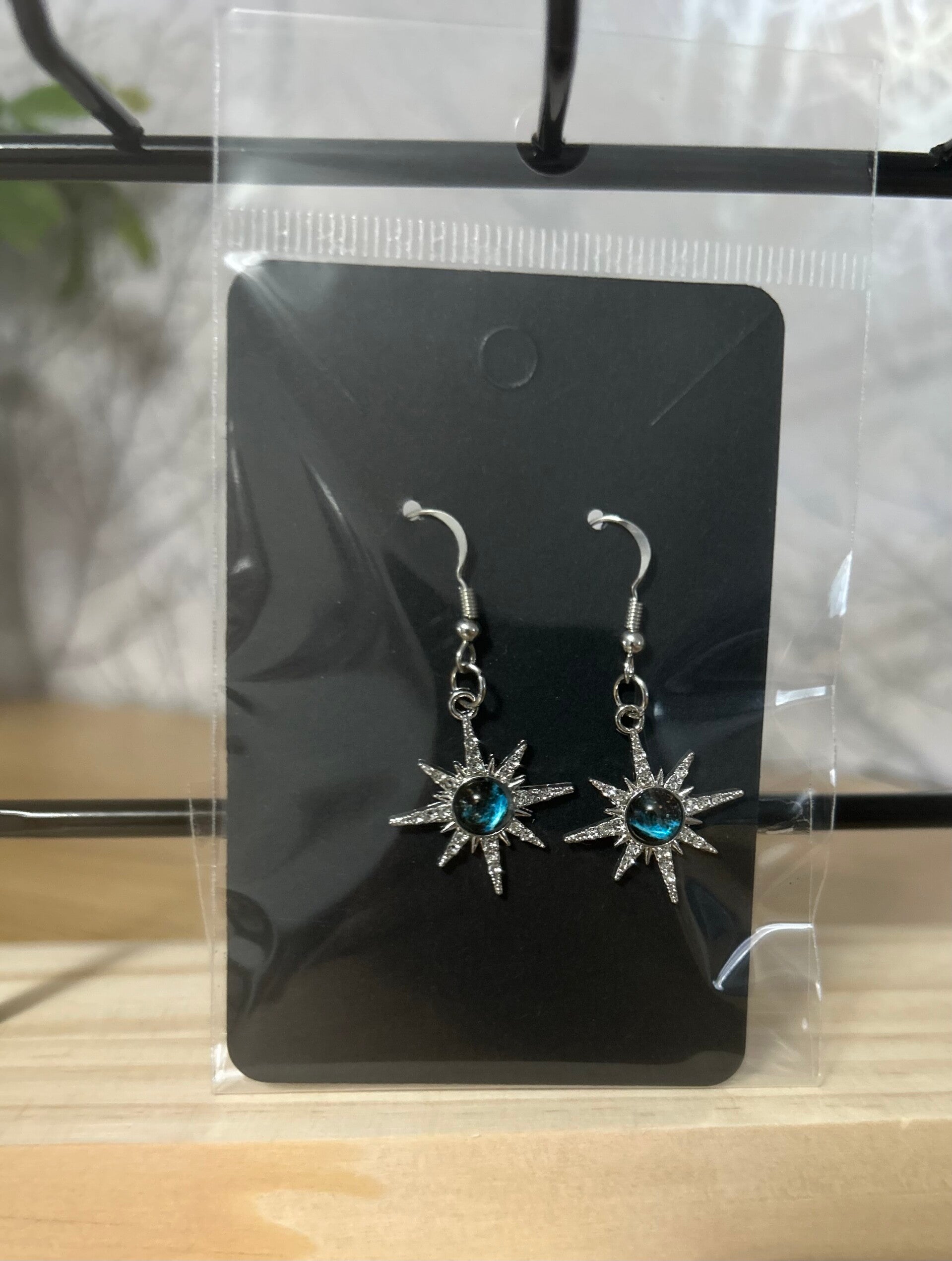 Silvery star earrings