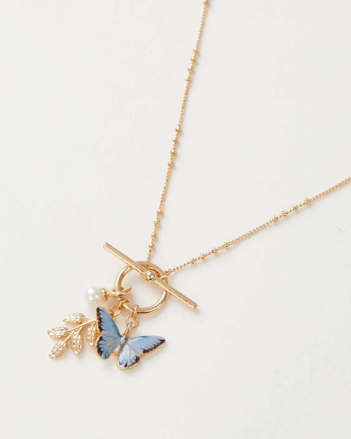 Vlindergeluk – ketting met blauwe vlinder