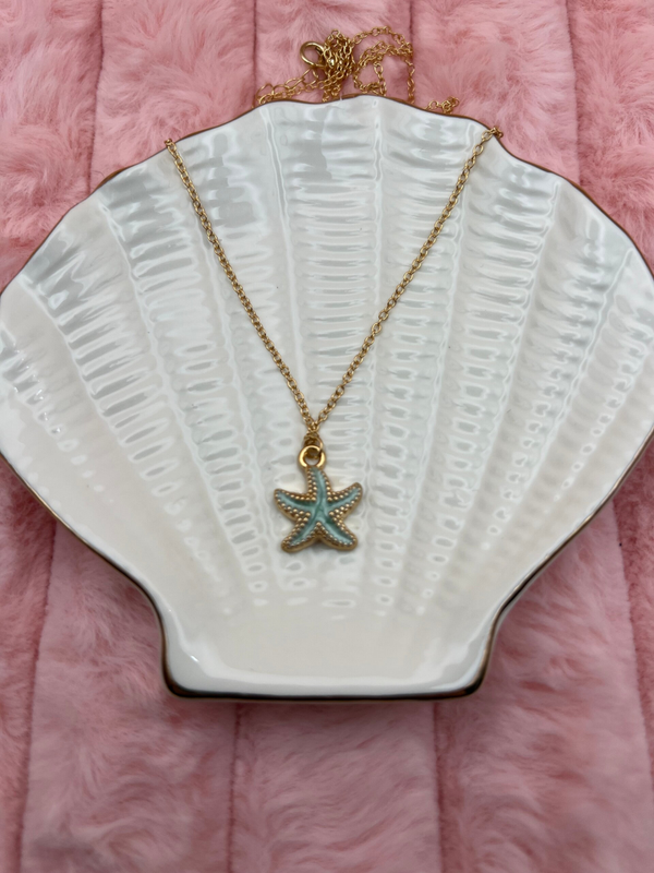 Goudkleurige ketting met lichtblauwe zeester