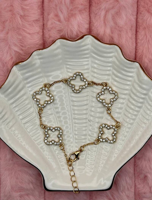 Goudkleurige klaverarmband met strass