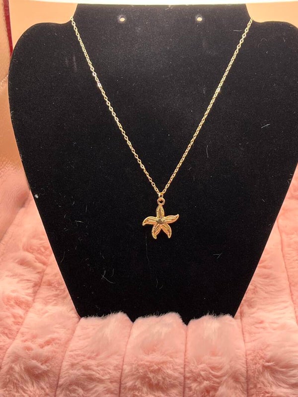 Goudkleurige ketting met zeester