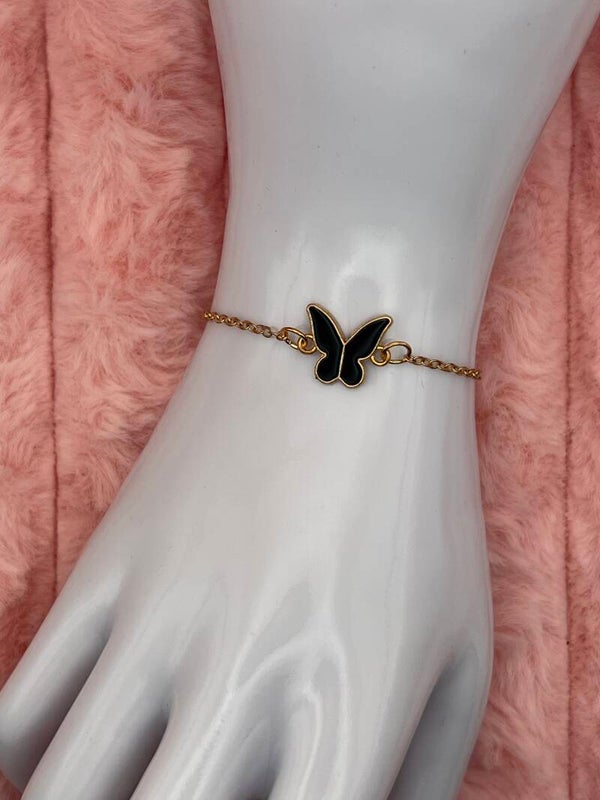Goudkleurige armband met zwarte vlinder