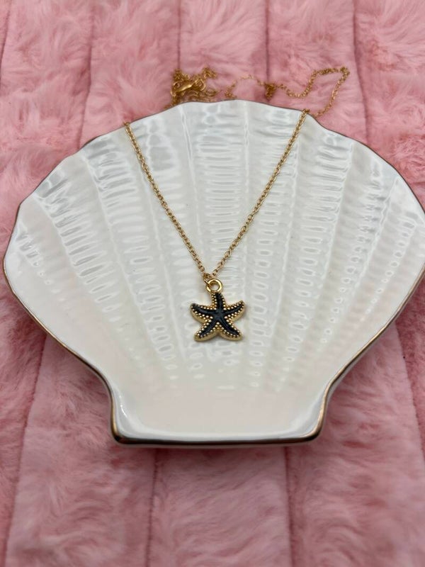 Goudkleurige ketting met zwarte zeester
