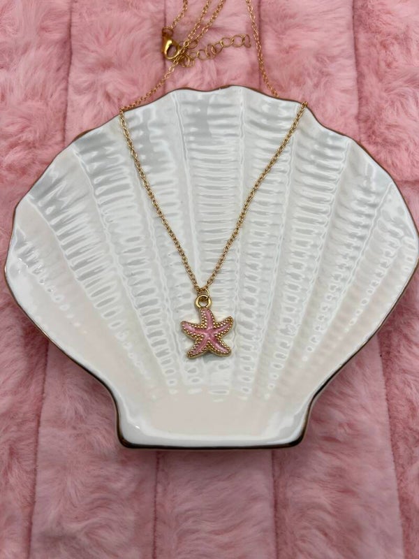 Goudkleurige ketting met roze zeester