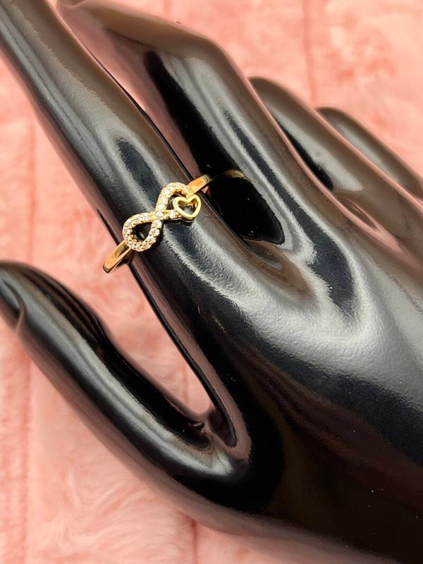 Goudkleurige verstelbare ring met infinity en hartje