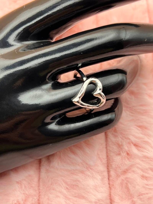 Zilverkleurige ring met open hart