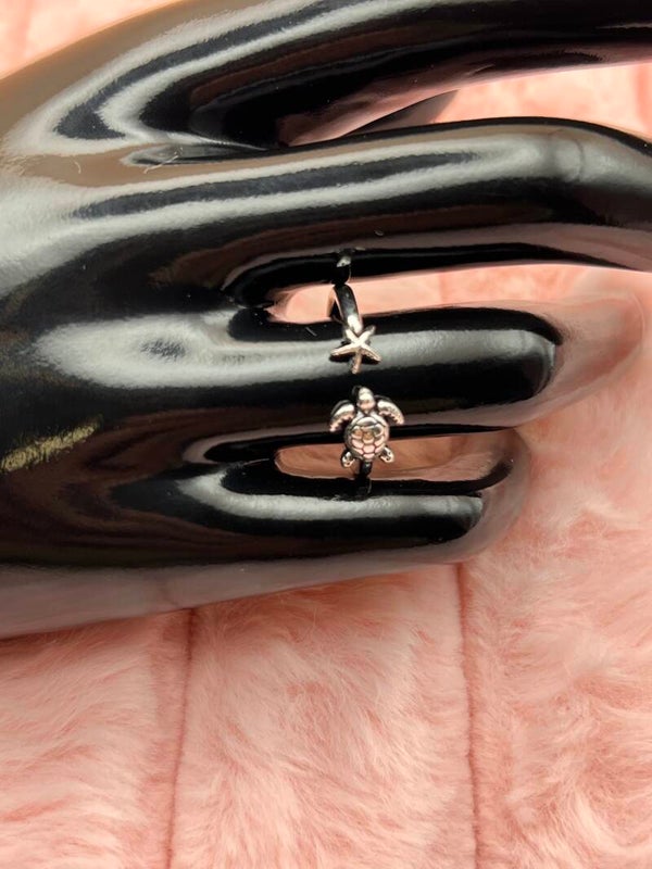 Zilverkleurige verstelbare ring met schildpad en zeester
