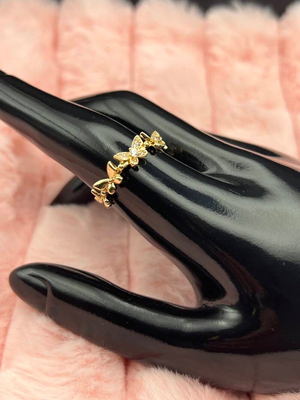 Goudkleurige ring met vlinders