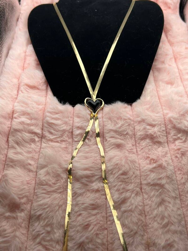 Goudkleurige lange ketting met zwart hart