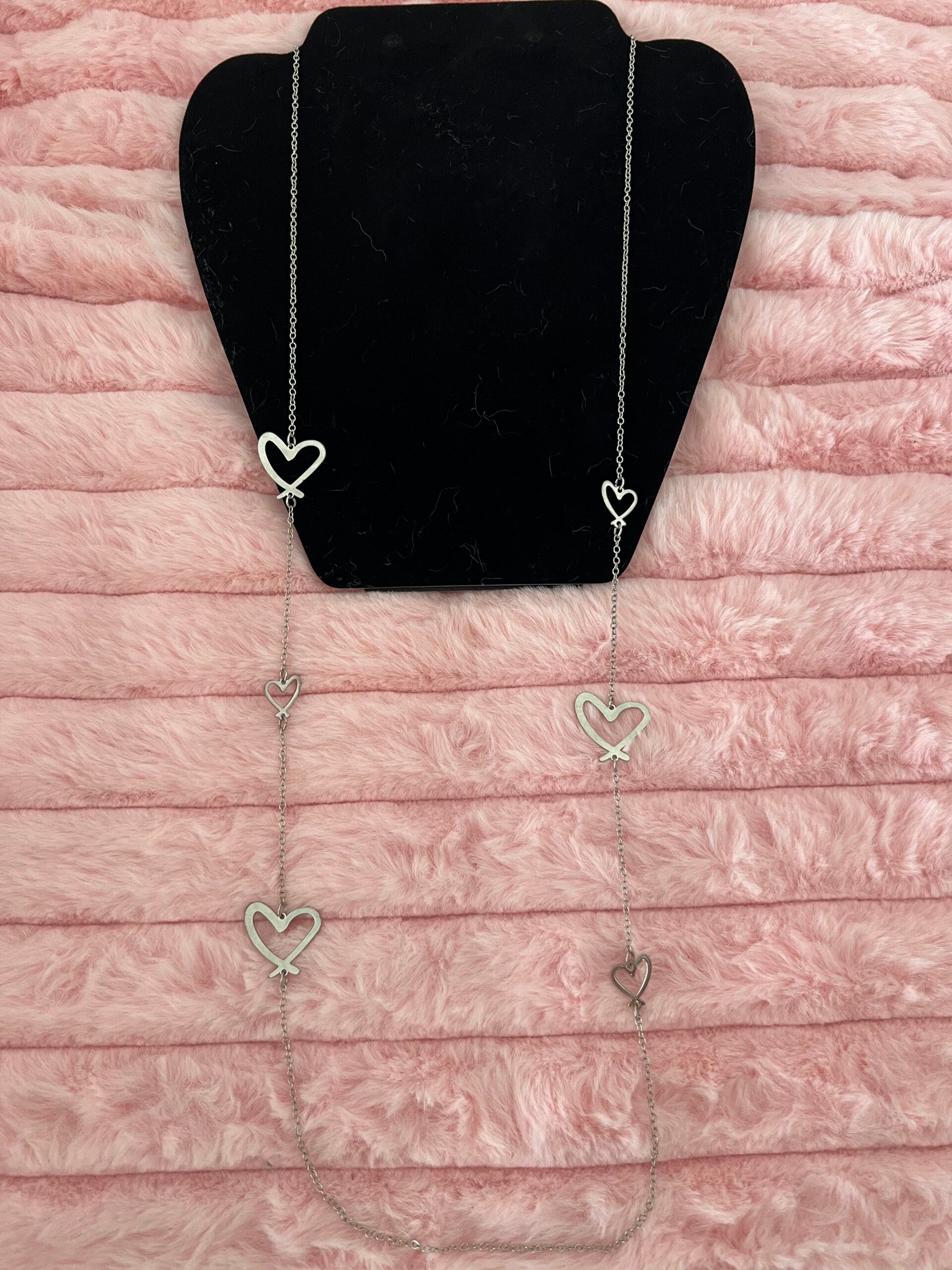 Lange ketting met open hartjes - zilverkleurig