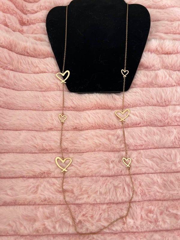 Lange ketting met open hartjes – goudkleurig