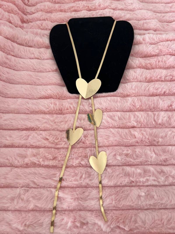 Goudkleurige lange ketting met hartjes
