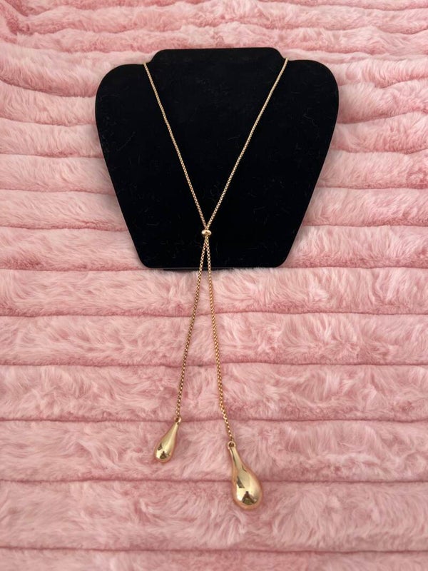 Goudkleurige ketting met druppels