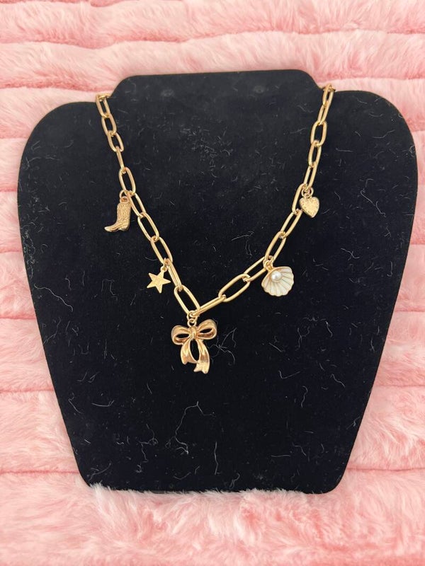 Goudkleurige schakelketting met bedels strikje