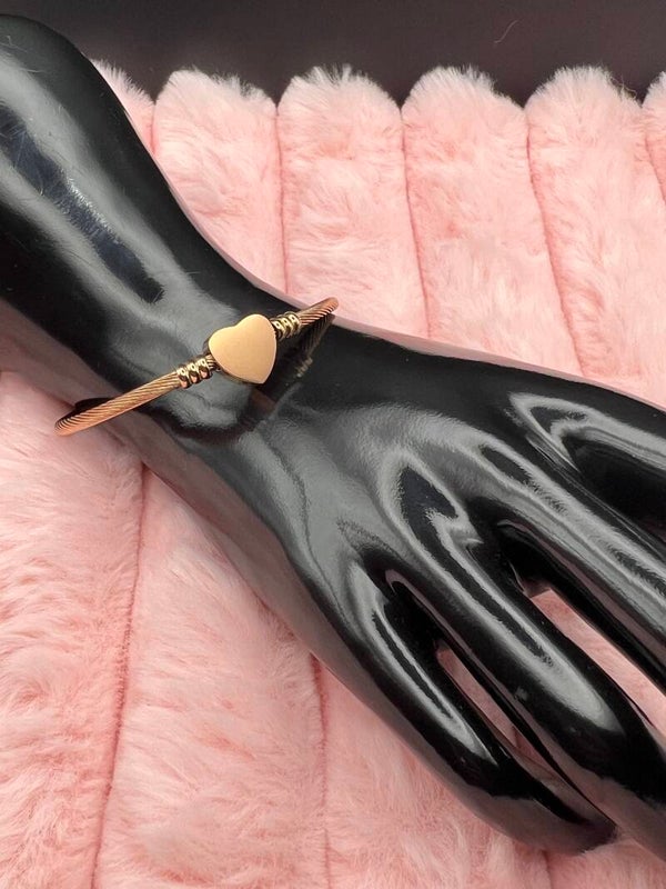 Roségoudkleurige bangle armband met hartje