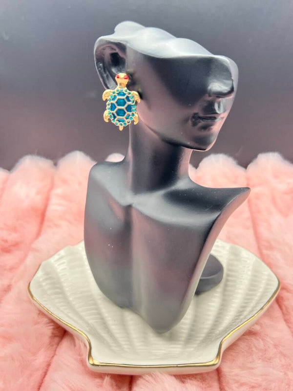 Goudkleurige oorbellen met turquoise schildpad