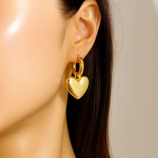 Lock hart oorbellen goud