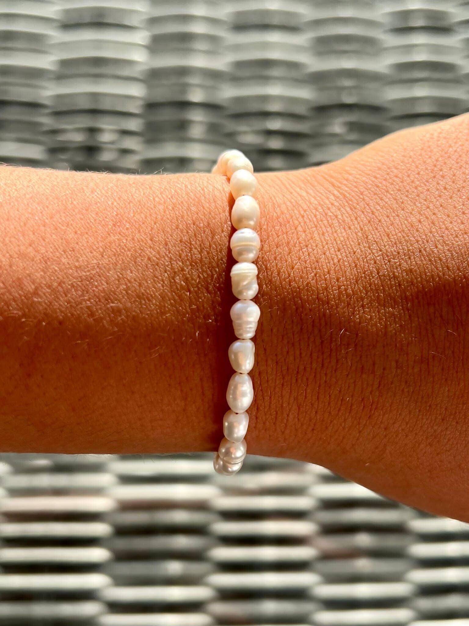 Stainless steel Parel armband goud