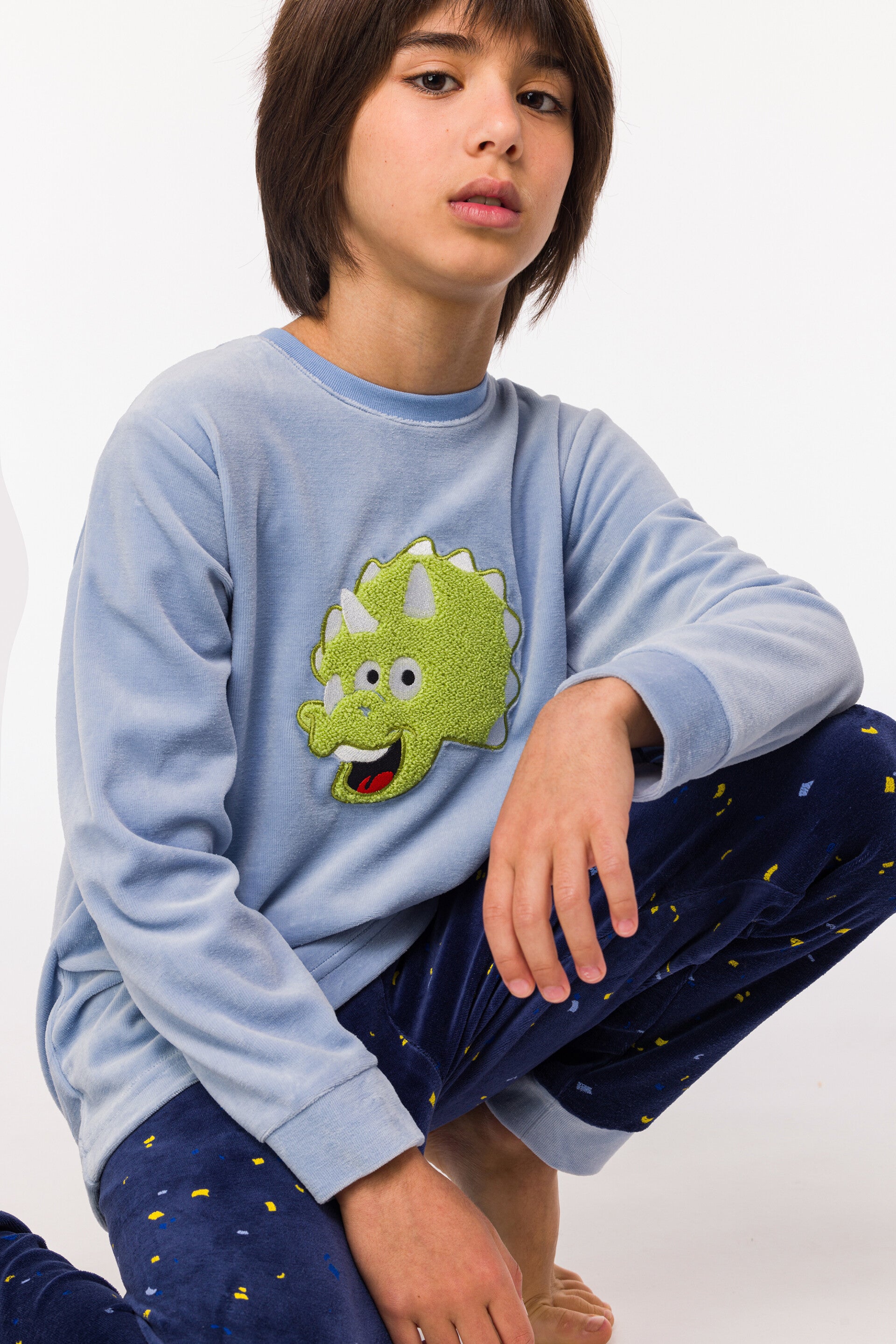 Jongens Pyjama lichtblauw, thema dino, 10 jaar