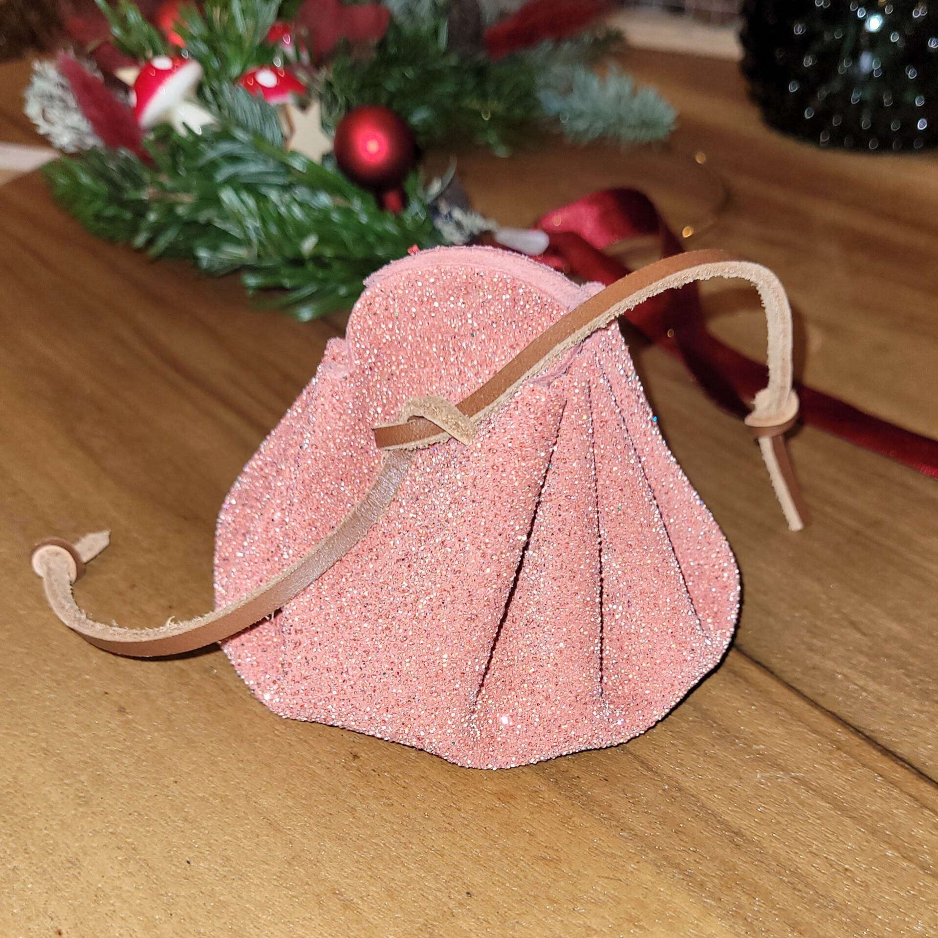 Bourse en cuir rose pailleté