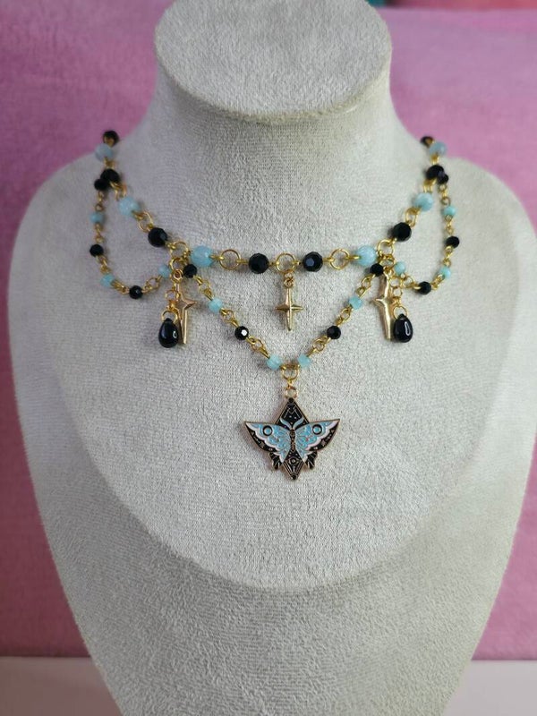 Gold Black and Blue Moth Necklace