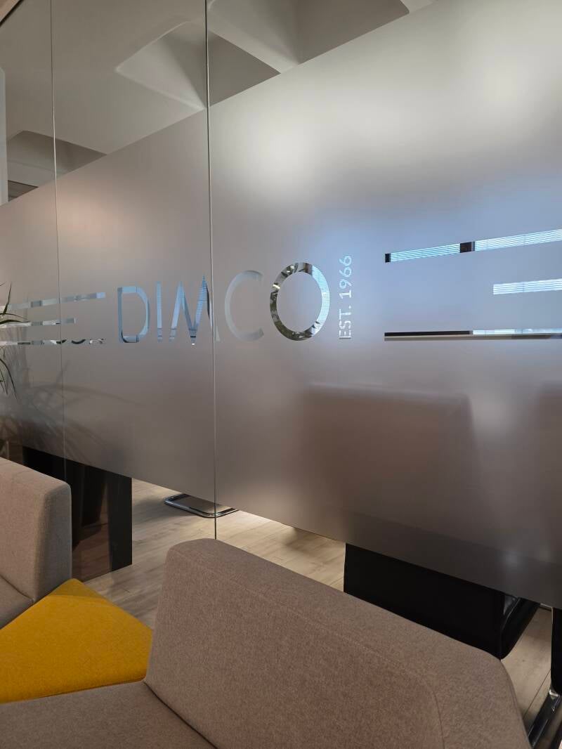 Frosted privacy film installed on an office glass door