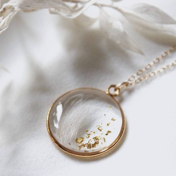 Hartjuweel rond met haar/as en bladgoud