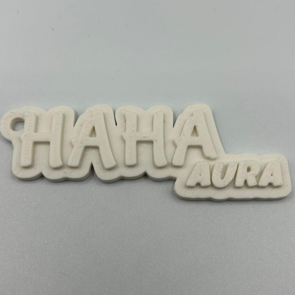 Brelok HAHA Aura