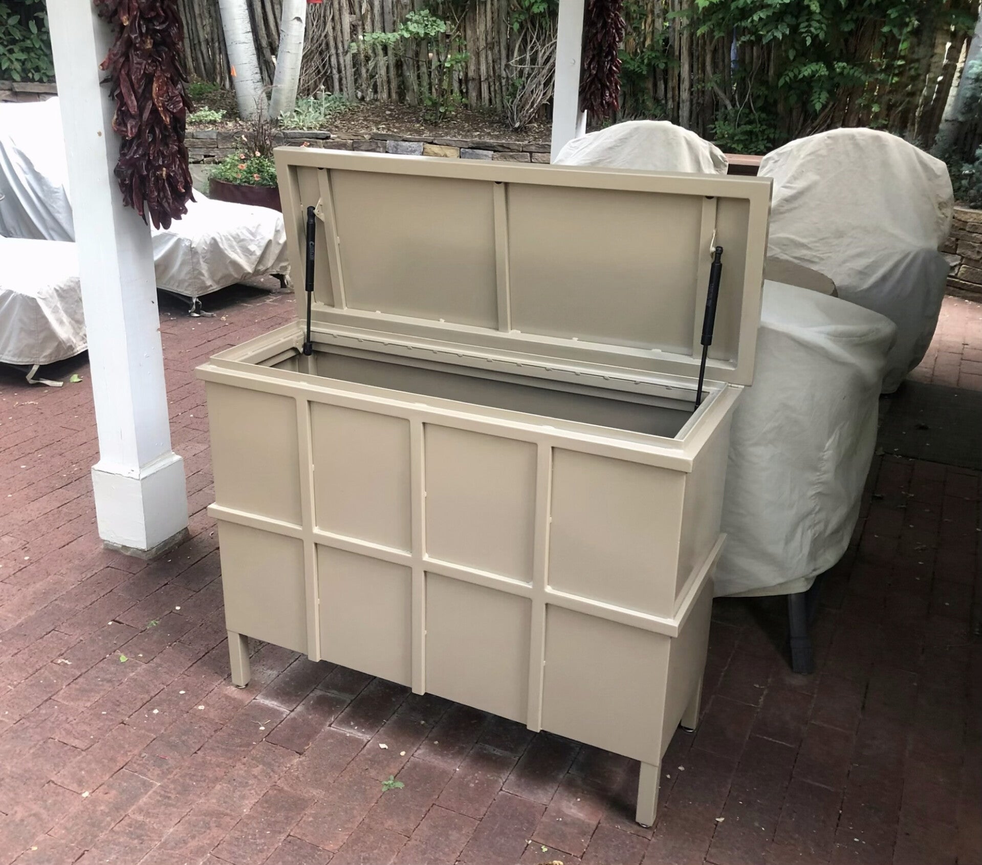 Top opening freestanding steel cabinet on Canyon Rd, Santa Fe