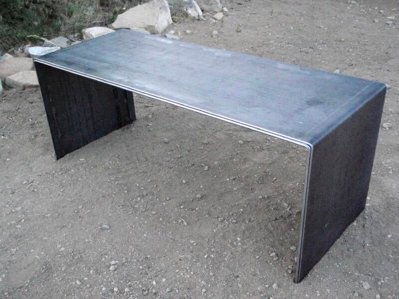Custom plate steel lobby table for Bueno Co. Albuquerque